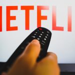 Netflix logo and remote control