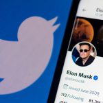 Elon Musk with Twitter logo